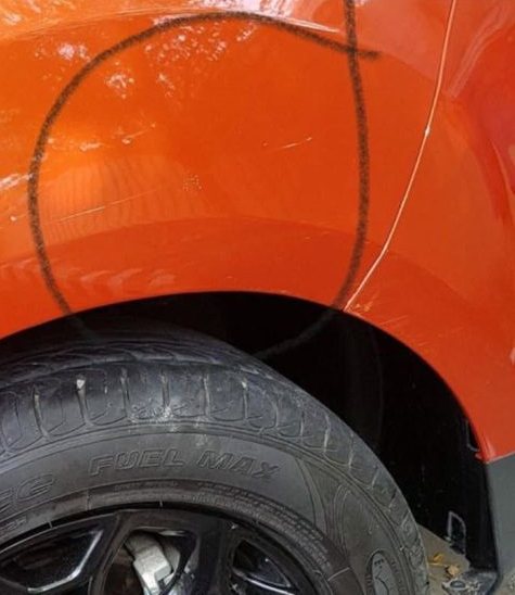 Orange guard dent, after
